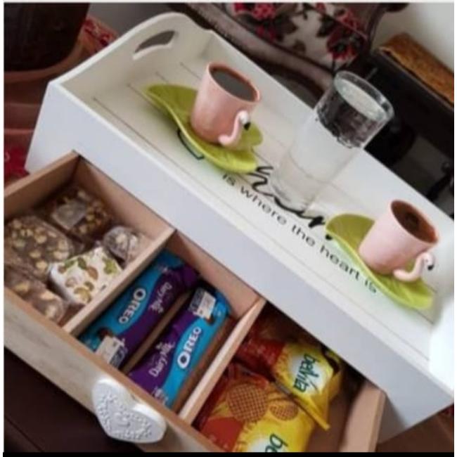 A tray with divided wooden drawer